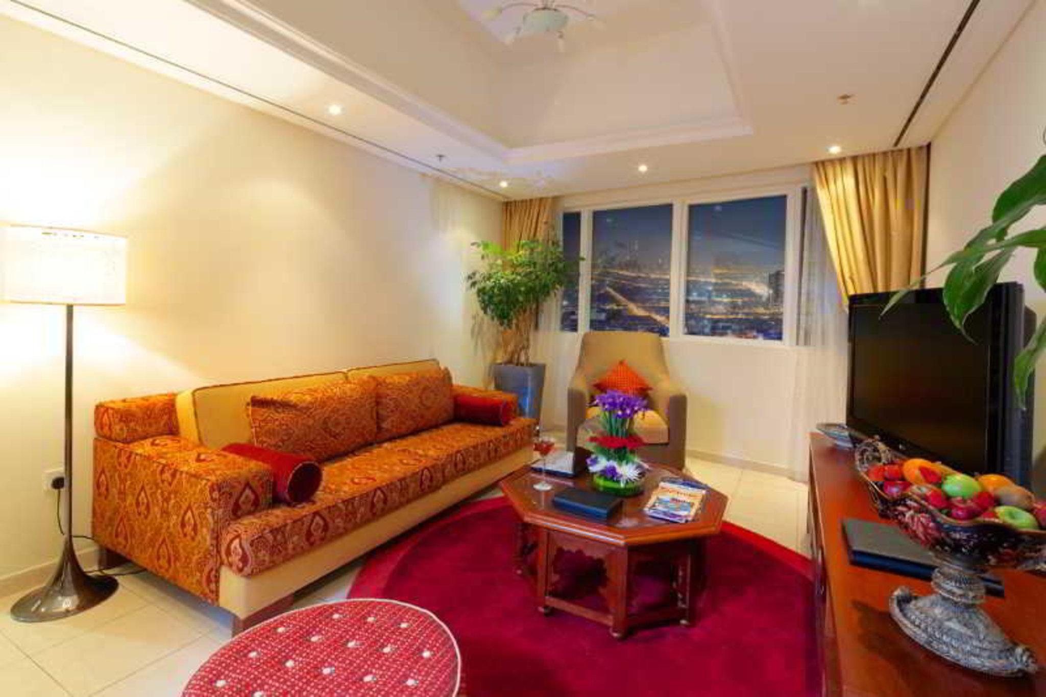 타마니 마리나 호텔 앤드 아파트먼트 두바이 외부 사진 A living room in a hotel suite