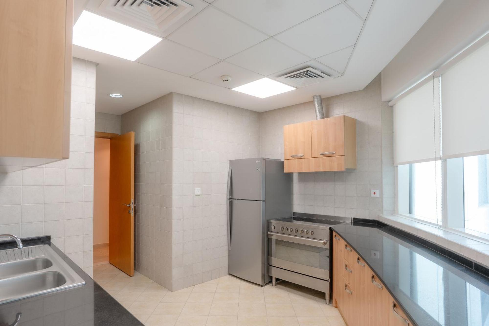 타마니 마리나 호텔 앤드 아파트먼트 두바이 외부 사진 A typical kitchen in a residential hall
