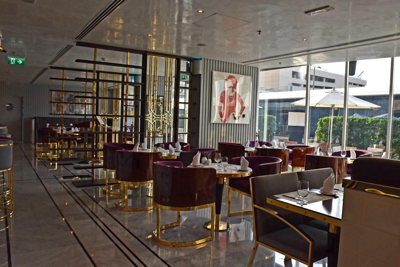 타마니 마리나 호텔 앤드 아파트먼트 두바이 외부 사진 The interior of the restaurant